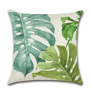 Fundas de almohada impermeables con diseño de plantas tropicales.