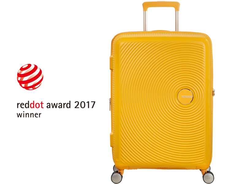 Soundbox; golden yellow; american tourister; suitcase; red dot award