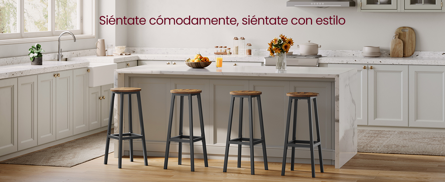 Modern white kitchen interior with matching bar stools and elegant cabinets